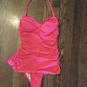Pink one piece swim suit with ruching